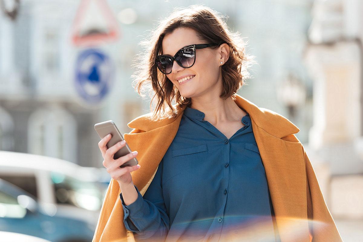 woman looking at phone