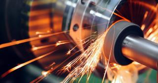 Industrial tool with sparks flying